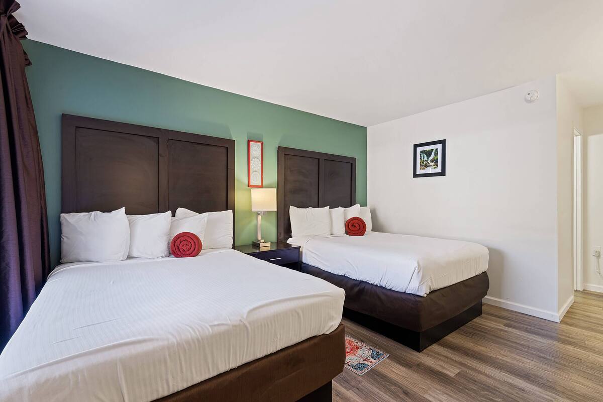 Deluxe Room, 2 Queen Beds, Non Smoking | Desk, blackout drapes, WiFi (free), bed sheets