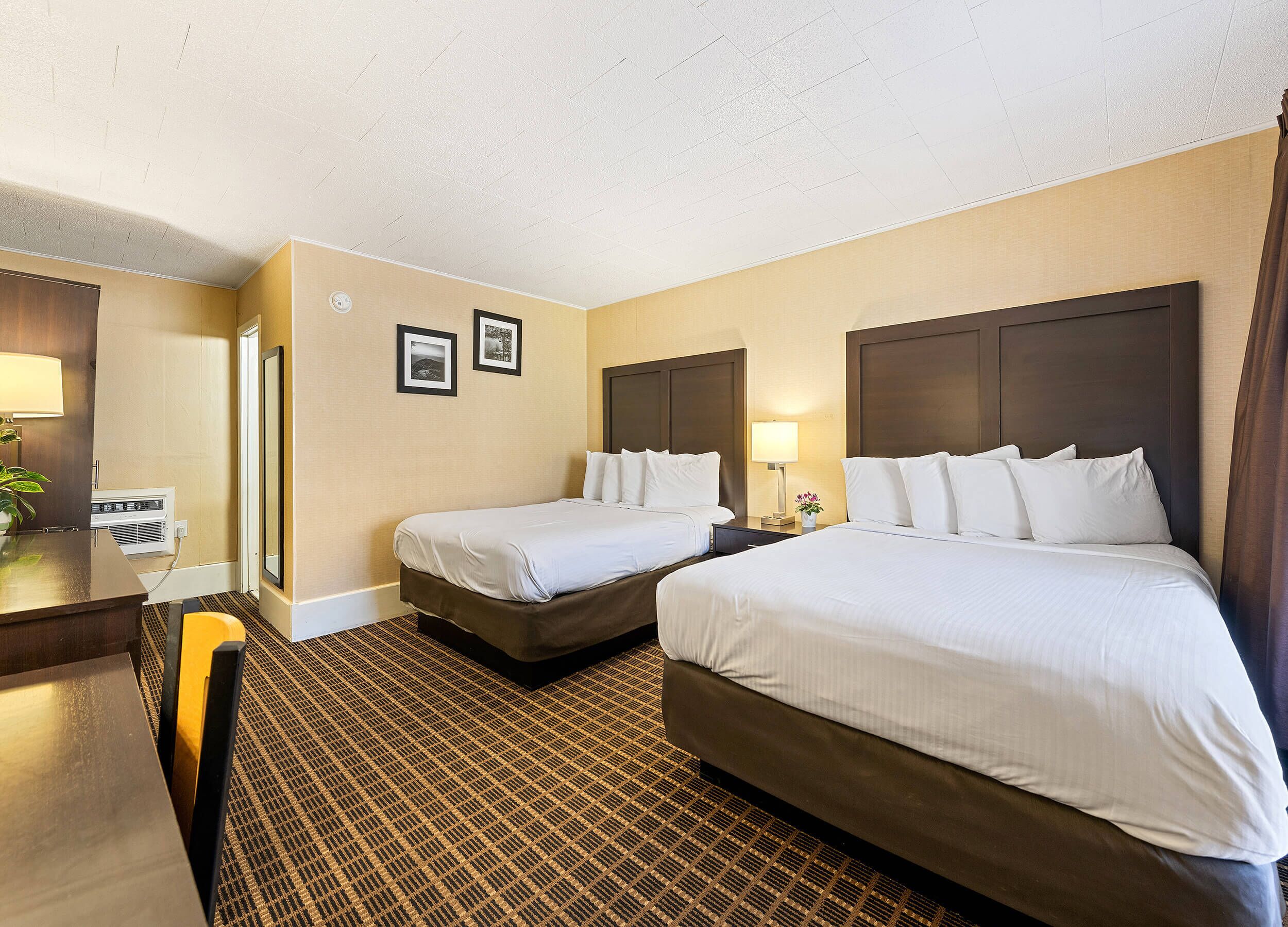 Room, 2 Queen Beds, Non Smoking | Desk, blackout drapes, free WiFi, bed sheets
