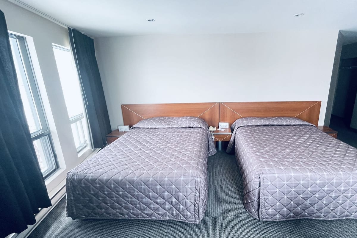 Premium Double Room, 2 Double Beds, Non Smoking | 1 bedroom, desk, free WiFi, bed sheets