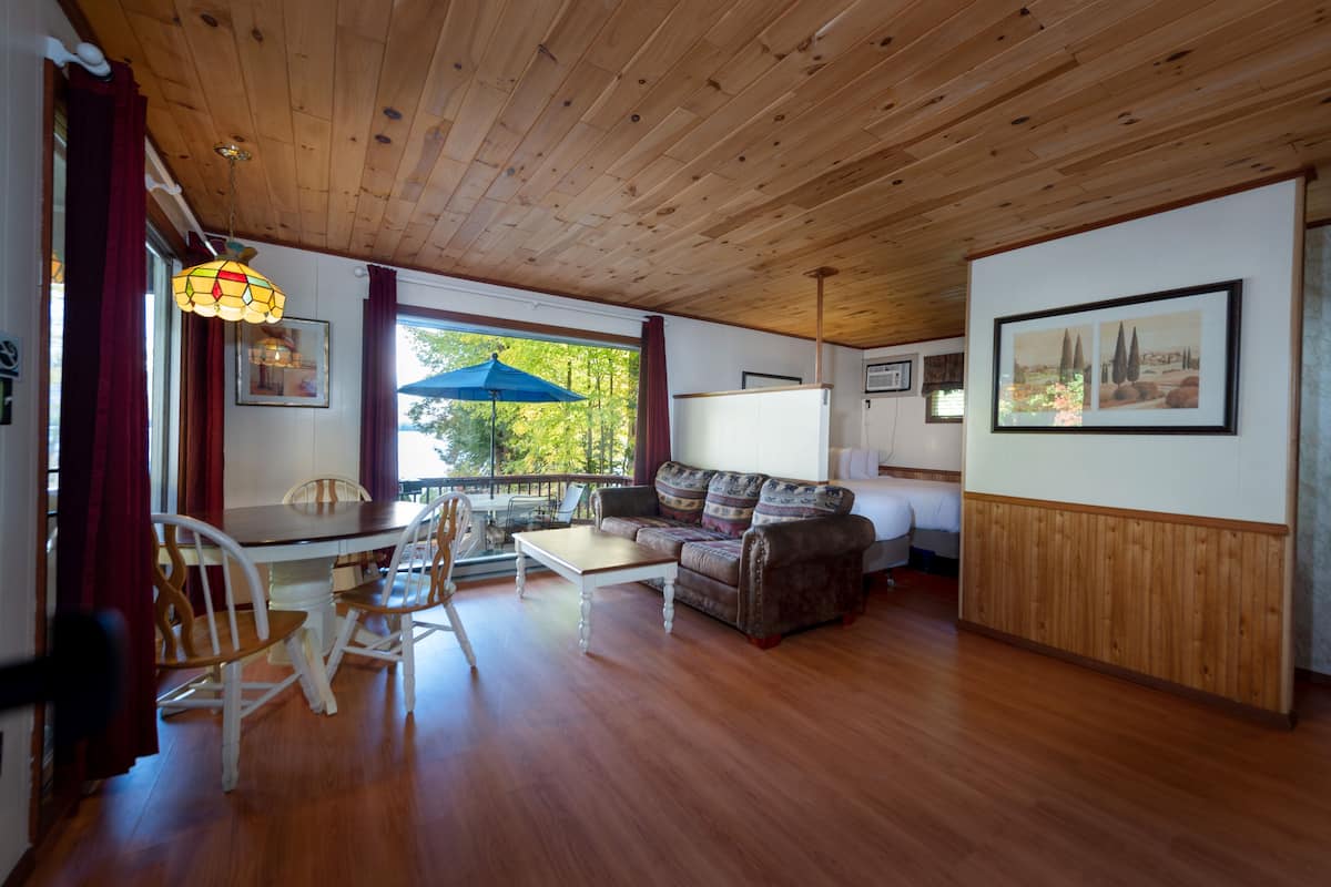 Lakefront Studio Suite, Private Deck, Upper Level | Living area | 43-inch flat-screen TV with cable channels