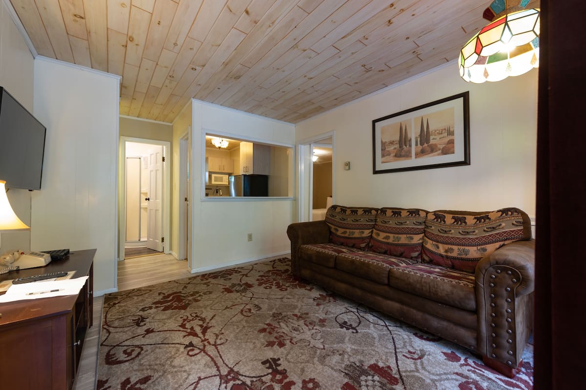 Lakeside 2 Bedroom Suite, Kitchenette, Large Private Deck | Living area | 43-inch flat-screen TV with cable channels