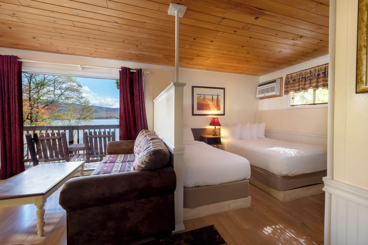 lakefront studio suite, private deck, upper level | 1 bedroom, iron/ironing board, free wifi, bed sheets