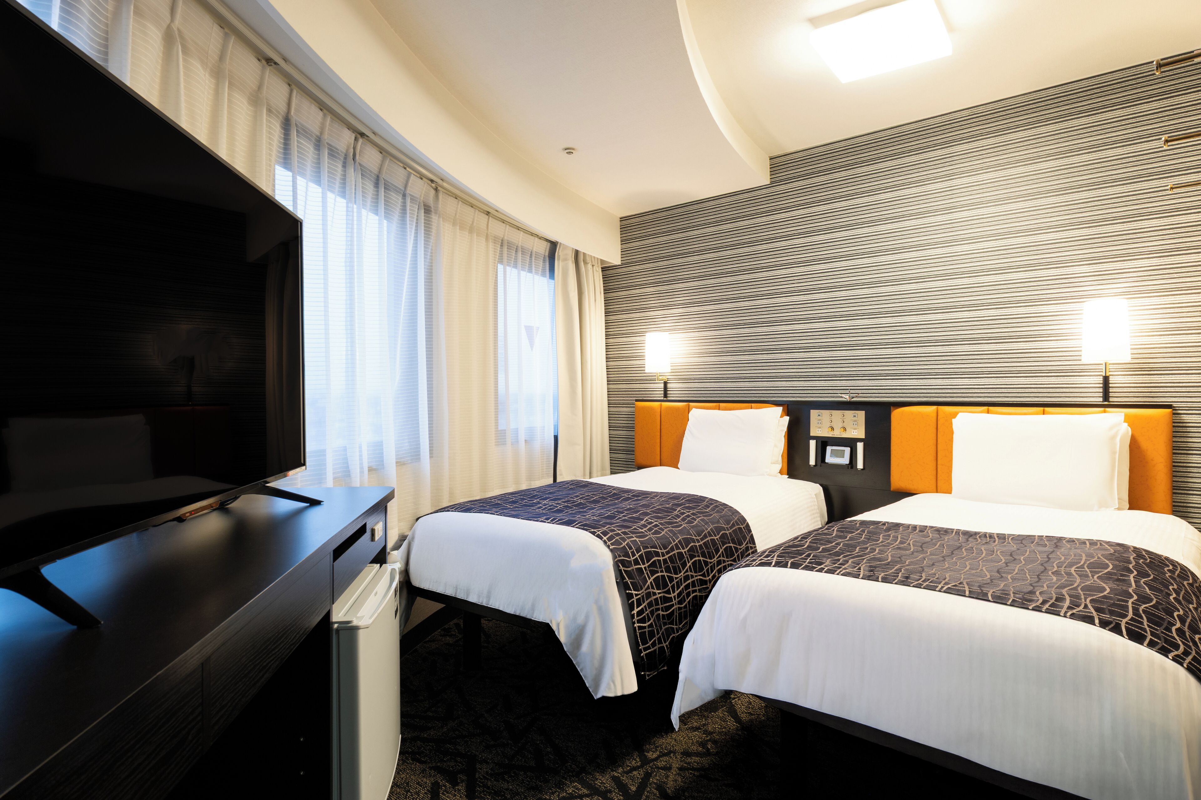 Desk, blackout curtains, free WiFi, bed sheets