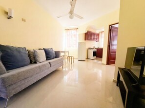 Comfort Apartment, 1 Bedroom, Kitchen, Beachside (with Air Conditioning ) | Living area | LED TV - Costambar (Puerto Plata)