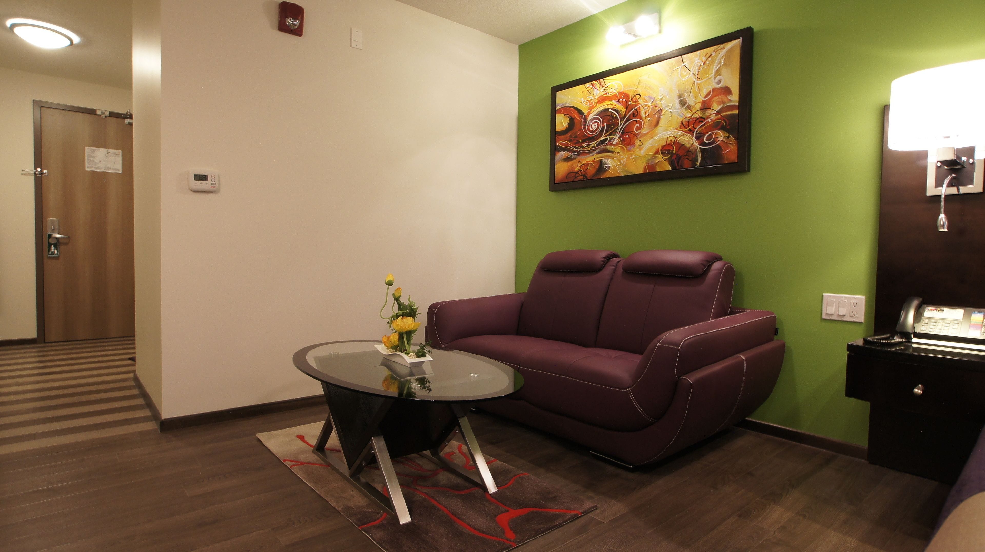 king bed w.c. accessible suite | living area | 42-inch led tv with digital channels, tv, fireplace