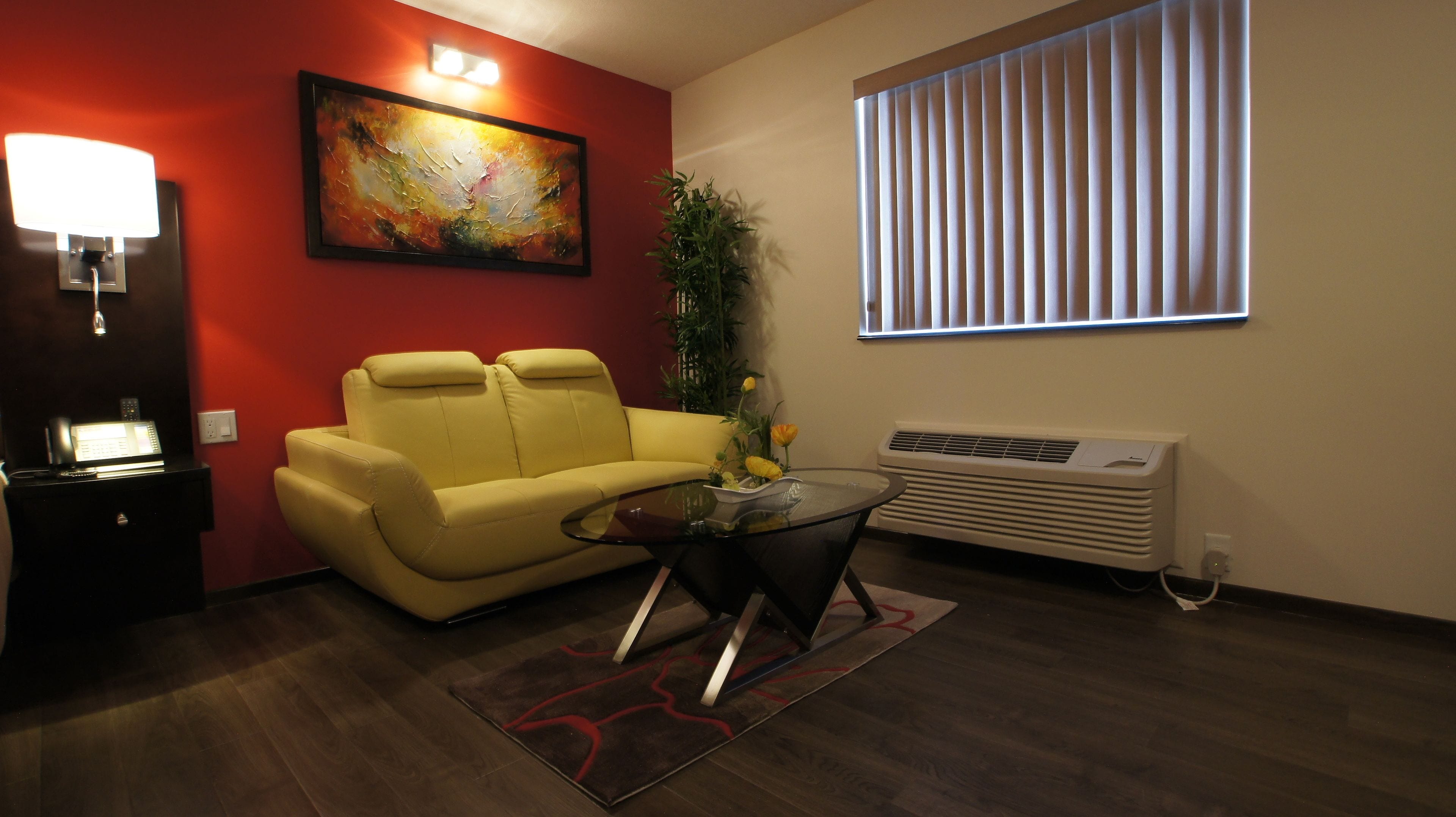 king bed jacuzzi premium suite | living area | 42-inch led tv with digital channels, tv, fireplace