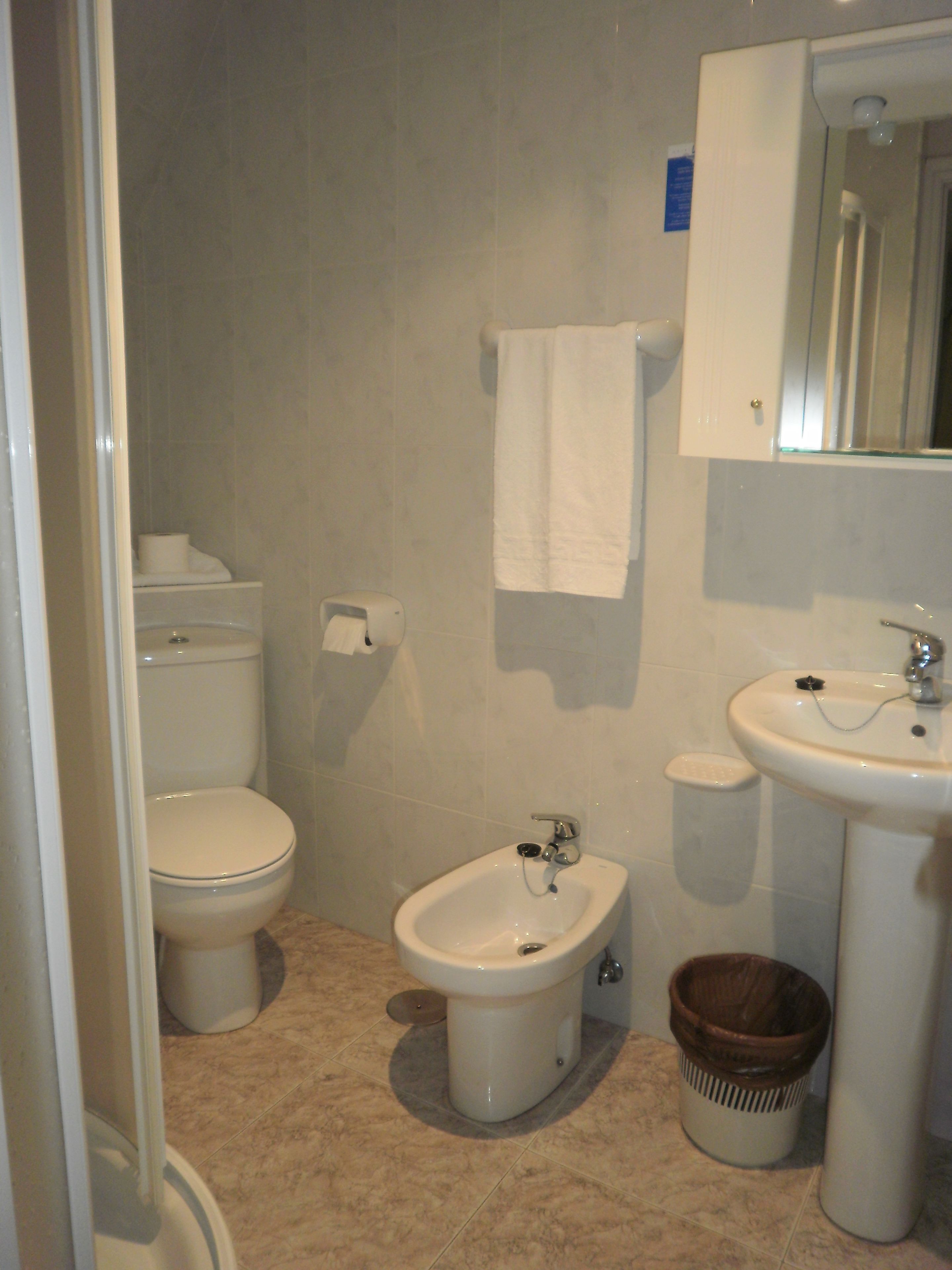 combined shower/bathtub, deep-soaking bathtub, rainfall showerhead