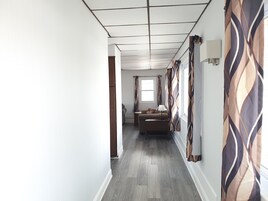 Apartment, 1 Bedroom, Kitchen, Partial Ocean View | Blackout drapes, iron/ironing board, free WiFi