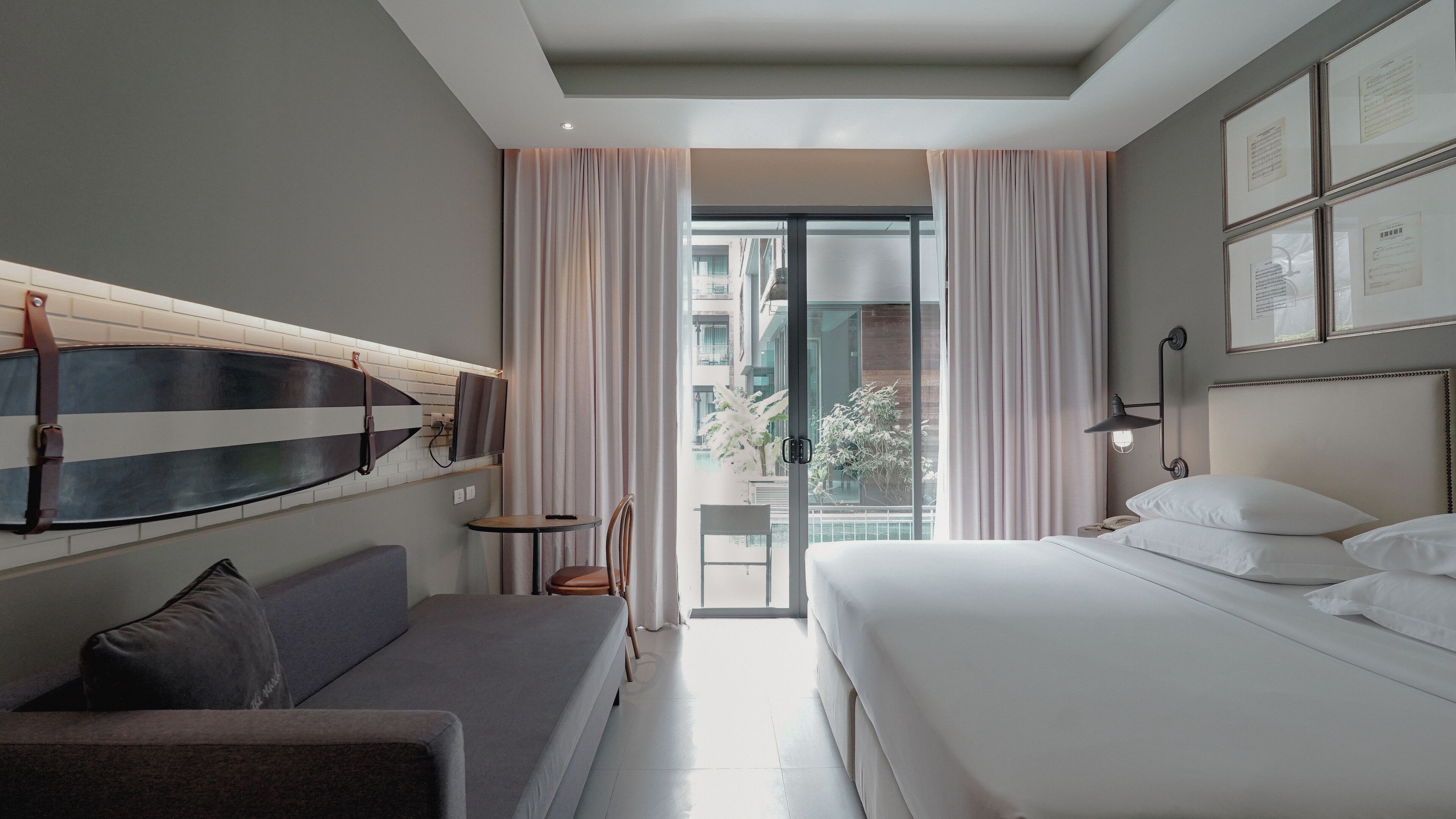 deluxe room, pool access | in-room safe, desk, blackout curtains, iron/ironing board