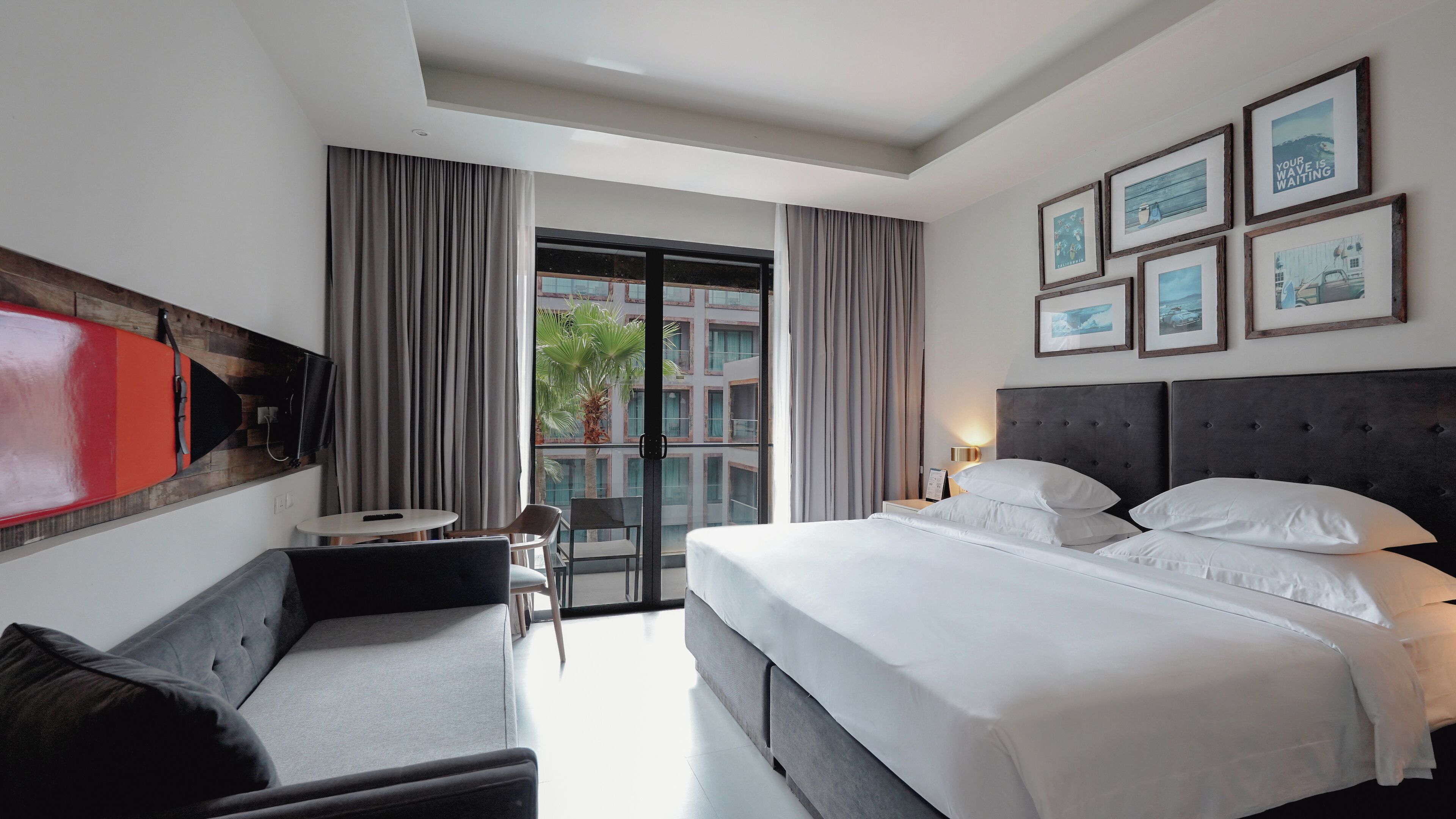 deluxe room, pool view | in-room safe, desk, blackout curtains, iron/ironing board