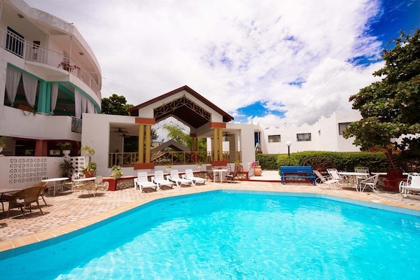 Outdoor pool, sun loungers