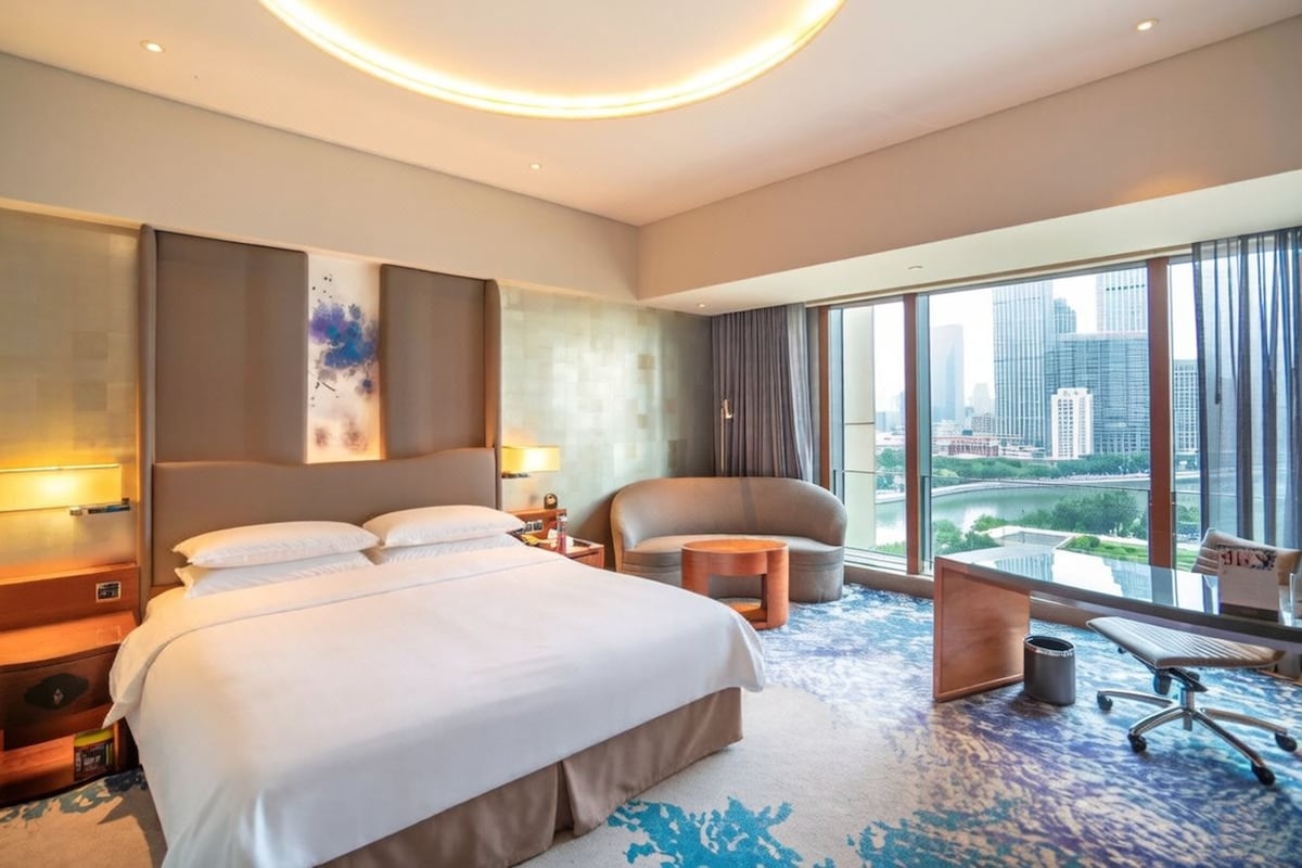 Literie hypoallergénique, couette en duvet, minibar, coffre-fort