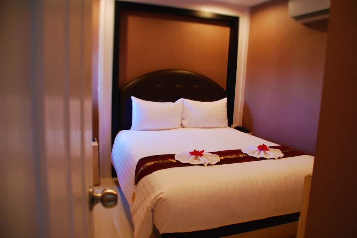 1 Bedroom | Minibar, caja de seguridad en la habitación y cunas gratuitas