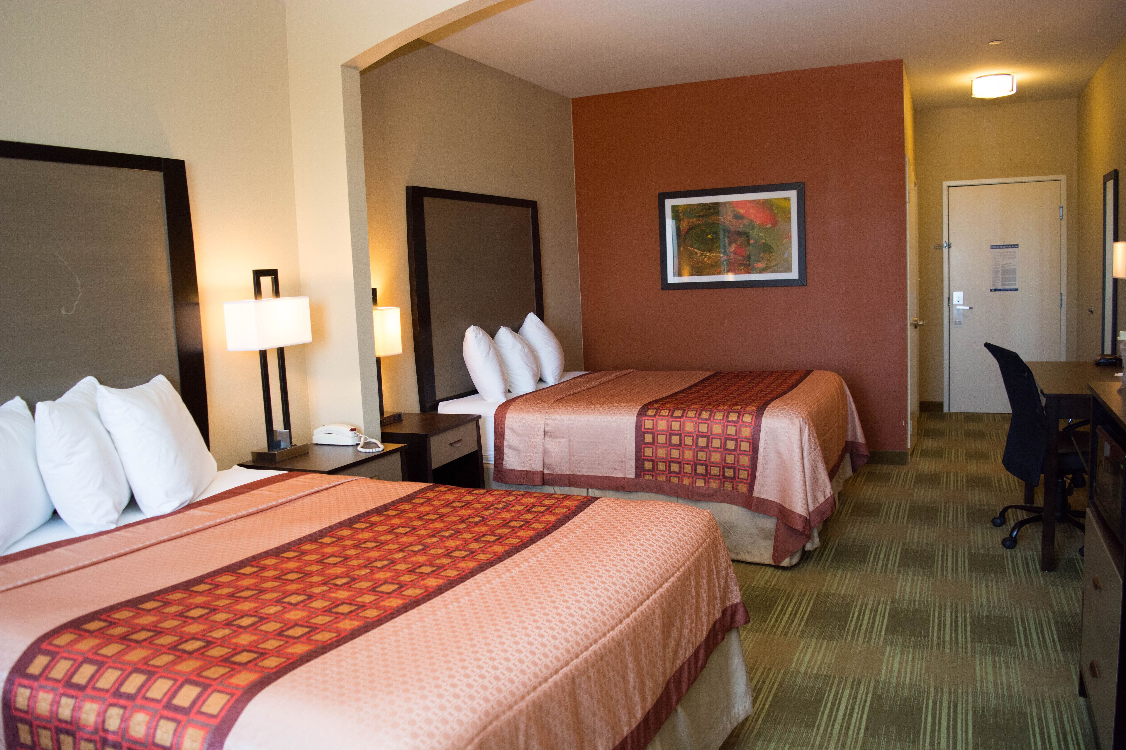 individually decorated, individually furnished, desk, blackout curtains