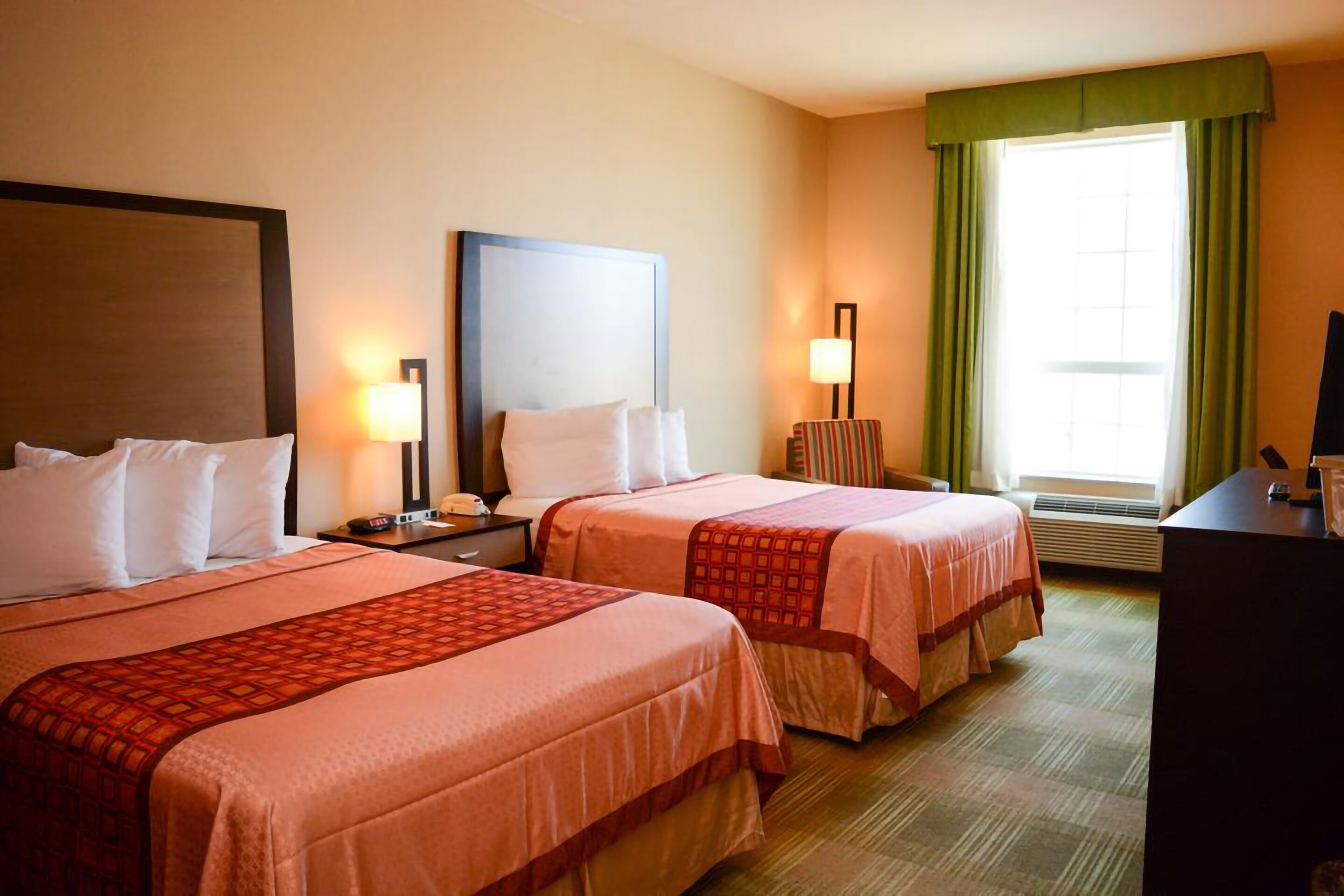 individually decorated, individually furnished, desk, blackout curtains