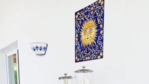A breakfast buffet with various food items and a decorative wall piece. - Il Giardino dei Pini (Capaccio-Paestum)