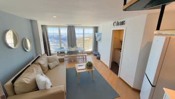 Family Duplex, 2 Bedrooms (6 Adults) | Living area | Flat-screen TV