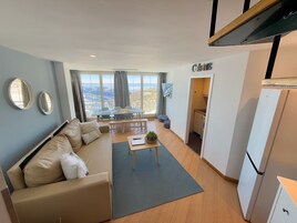 Family Duplex, 2 Bedrooms (6 Adults) | Living area | Flat-screen TV