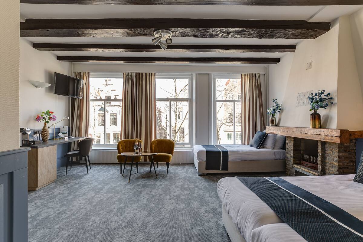 deluxe triple room | hypo-allergenic bedding, in-room safe, desk, iron/ironing board