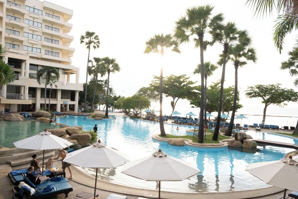 2 outdoor pools, open 7:00 AM to 7:00 PM, pool umbrellas, sun loungers