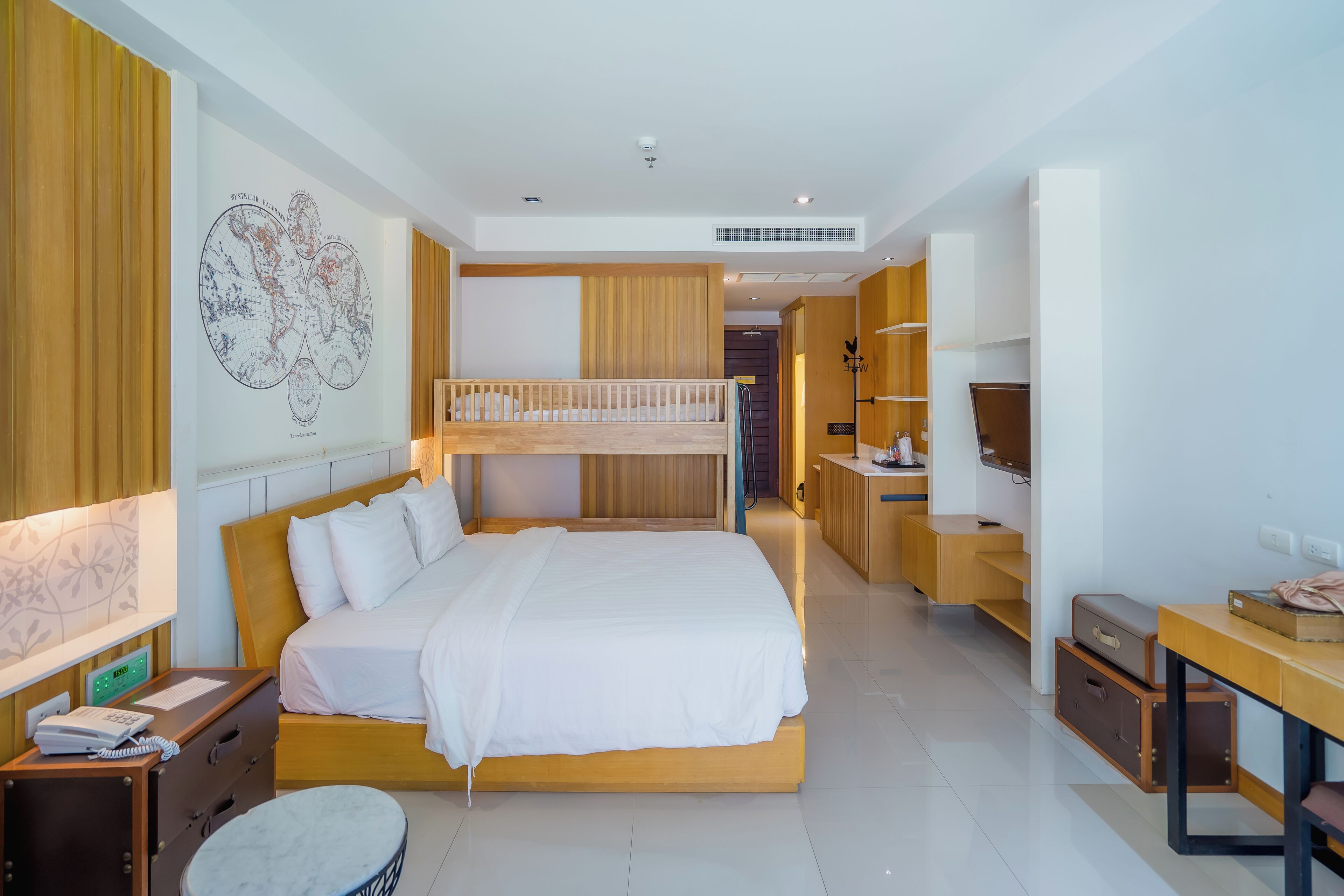 Family Deluxe | Premium bedding, minibar, in-room safe, individually decorated