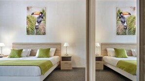 Suite | Premium bedding, in-room safe, desk, blackout curtains