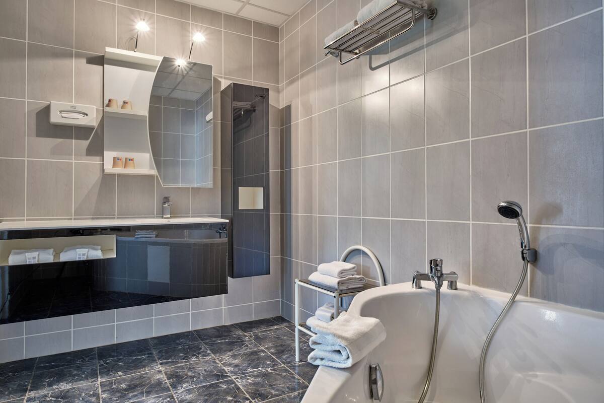 suite | bathroom | hair dryer, towels