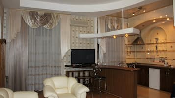 Apartment, 1 Bedroom | Living room | Plasma TV