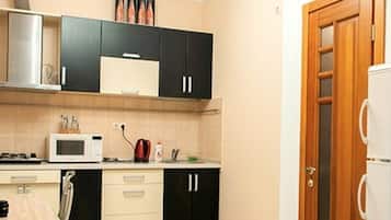 Apartment, 1 Bedroom | Private kitchen | Full-sized fridge, microwave, stovetop, coffee/tea maker