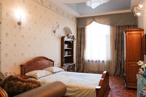 Apartment, 2 Schlafzimmer | Daunenbettdecken, individuell dekoriert, individuell eingerichtet