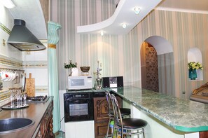 Apartment, 2 Bedrooms | Private kitchenette | Full-size fridge, microwave, stovetop, coffee/tea maker