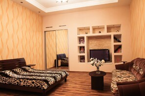 Apartment, 1 Schlafzimmer | Daunenbettdecken, individuell dekoriert, individuell eingerichtet