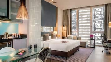 Hypo-allergenic bedding, down duvets, in-room safe