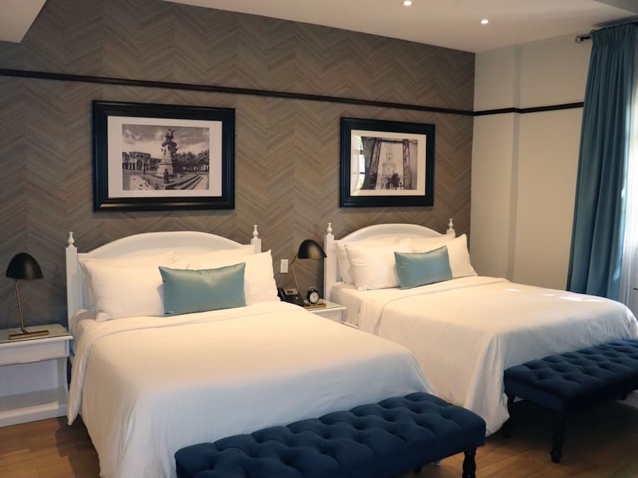 Suíte júnior, vista para a cidade | Frigobar, cofres nos quartos, Wi-Fi de cortesia