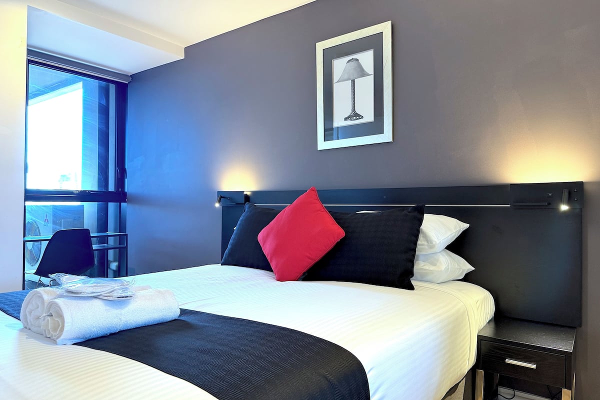 1 bedroom, desk, laptop workspace, blackout curtains