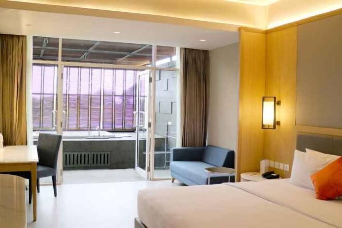 1 Schlafzimmer, hochwertige Bettwaren, Minibar, Zimmersafe