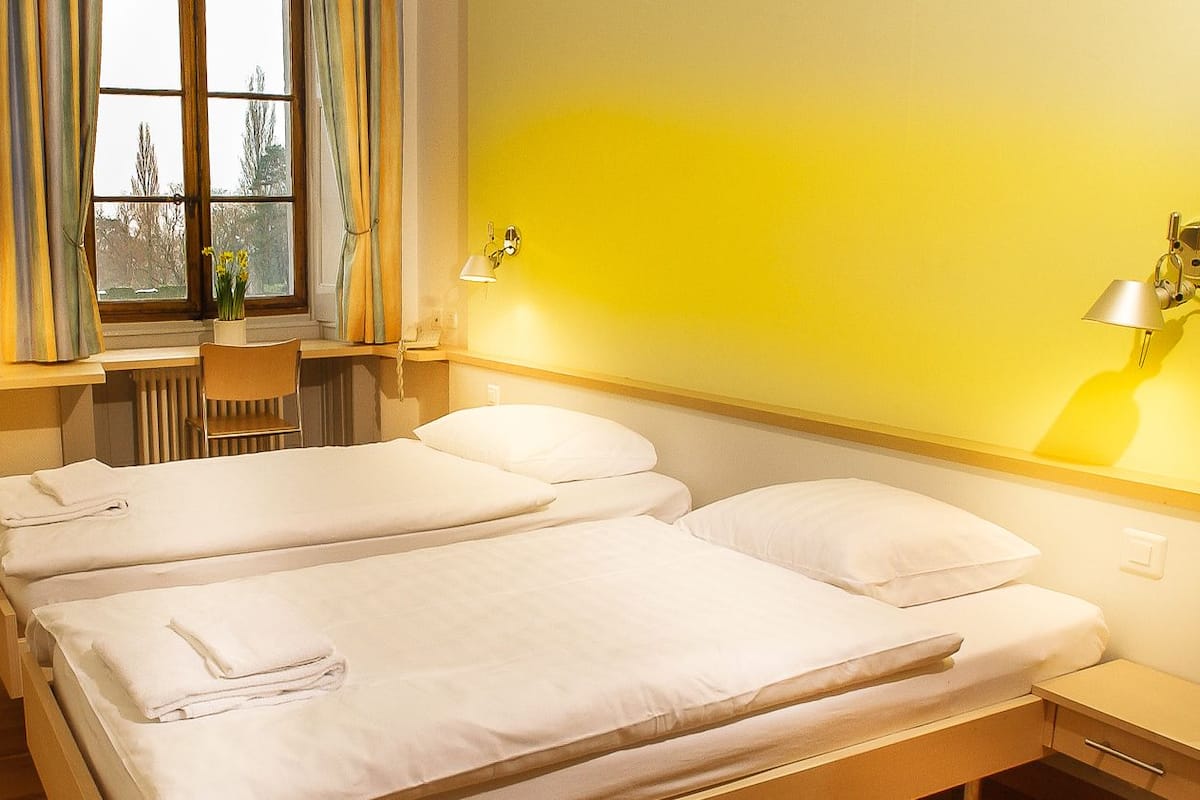 standard twin room, private bathroom, lake view (château léman) | desk, free wifi, bed sheets