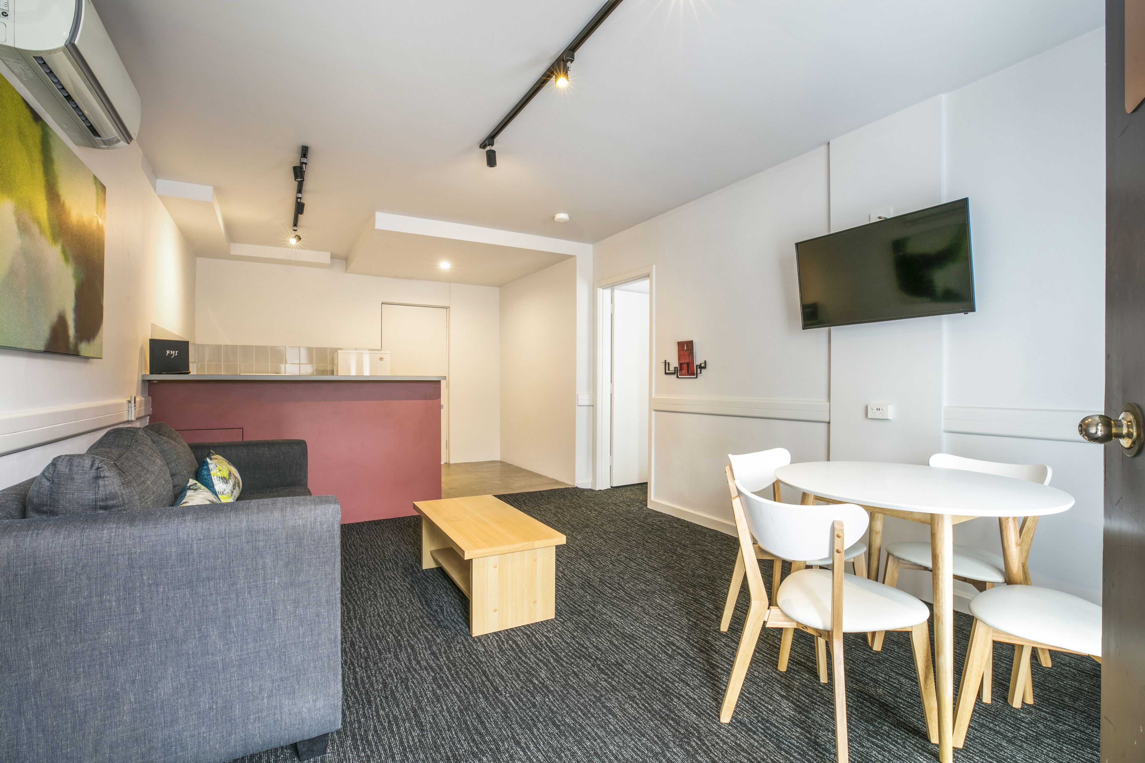 one bedroom apartment | living area | lcd tv