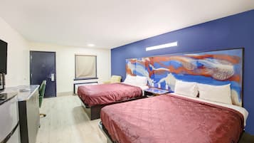 Chambre, 2 grands lits, non-fumeurs | Bureau, fer et planche Ă repasser, Wi-Fi gratuit, draps fournis