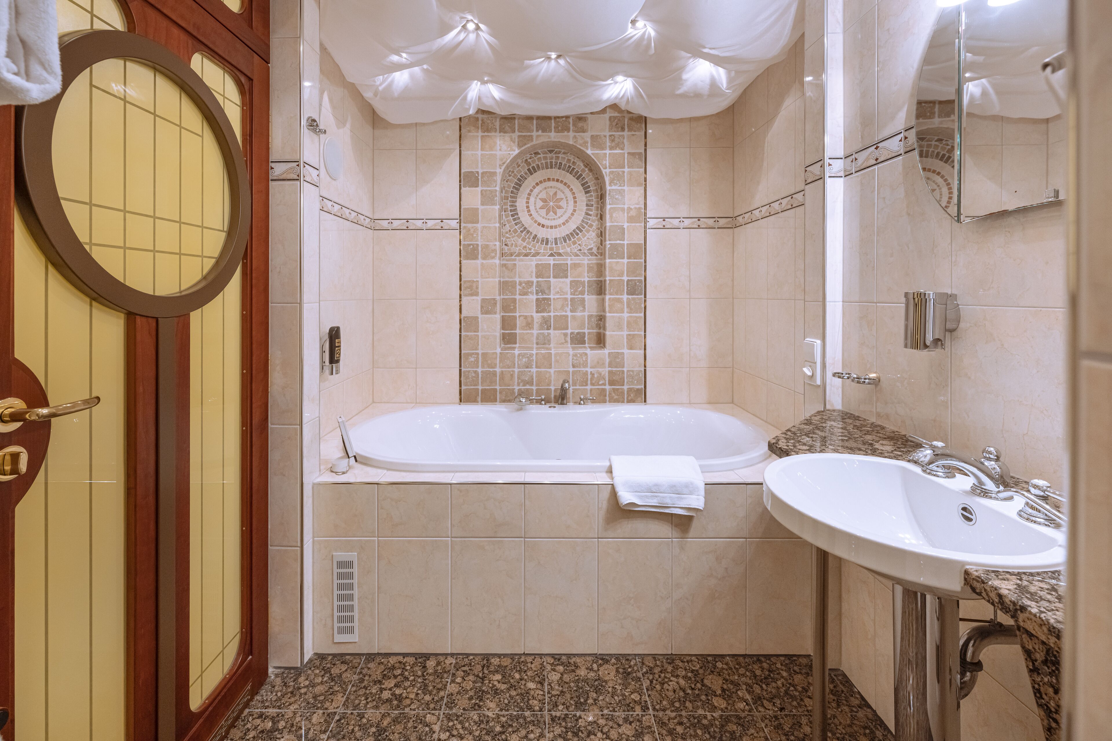 suite | bathroom | shower, hair dryer, towels