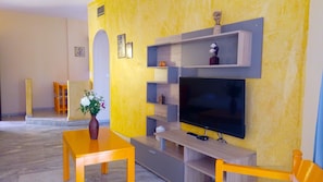 Een 40-inch lcd-televisie met satellietzenders en een televisie