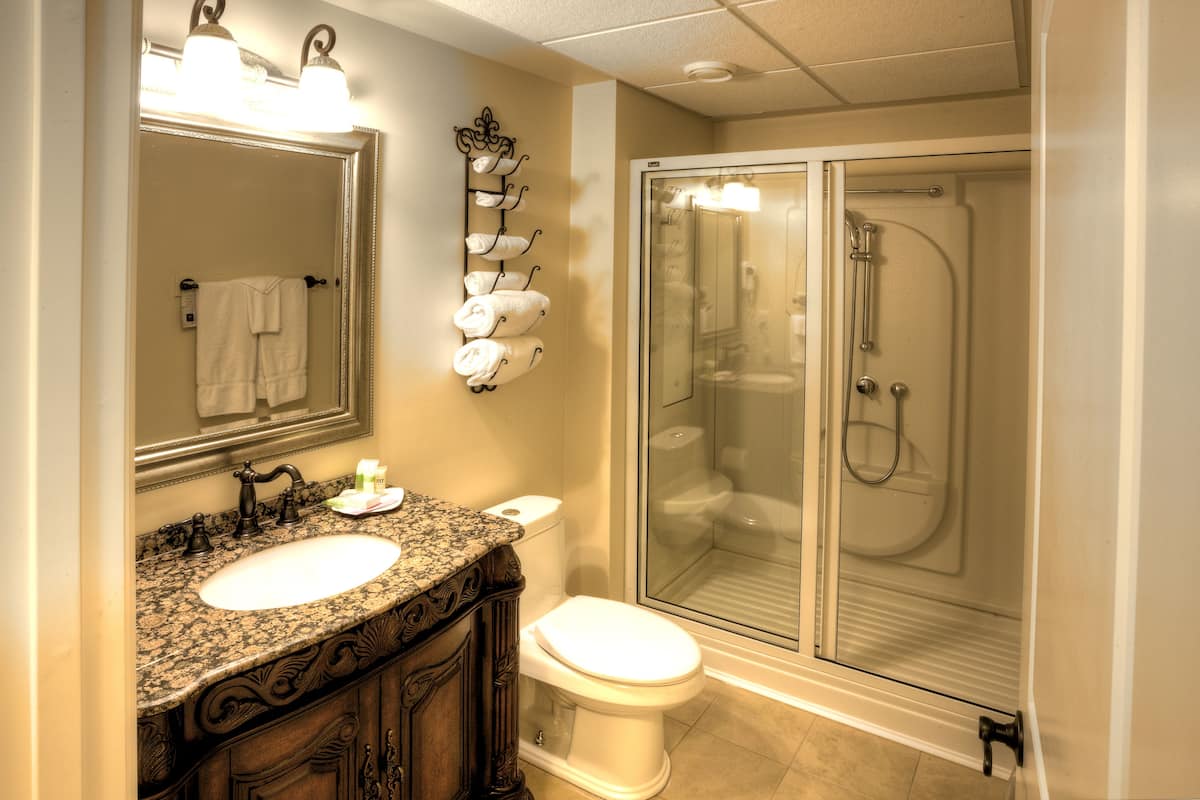 classic queen guest room | bathroom | free toiletries, hair dryer, towels, soap