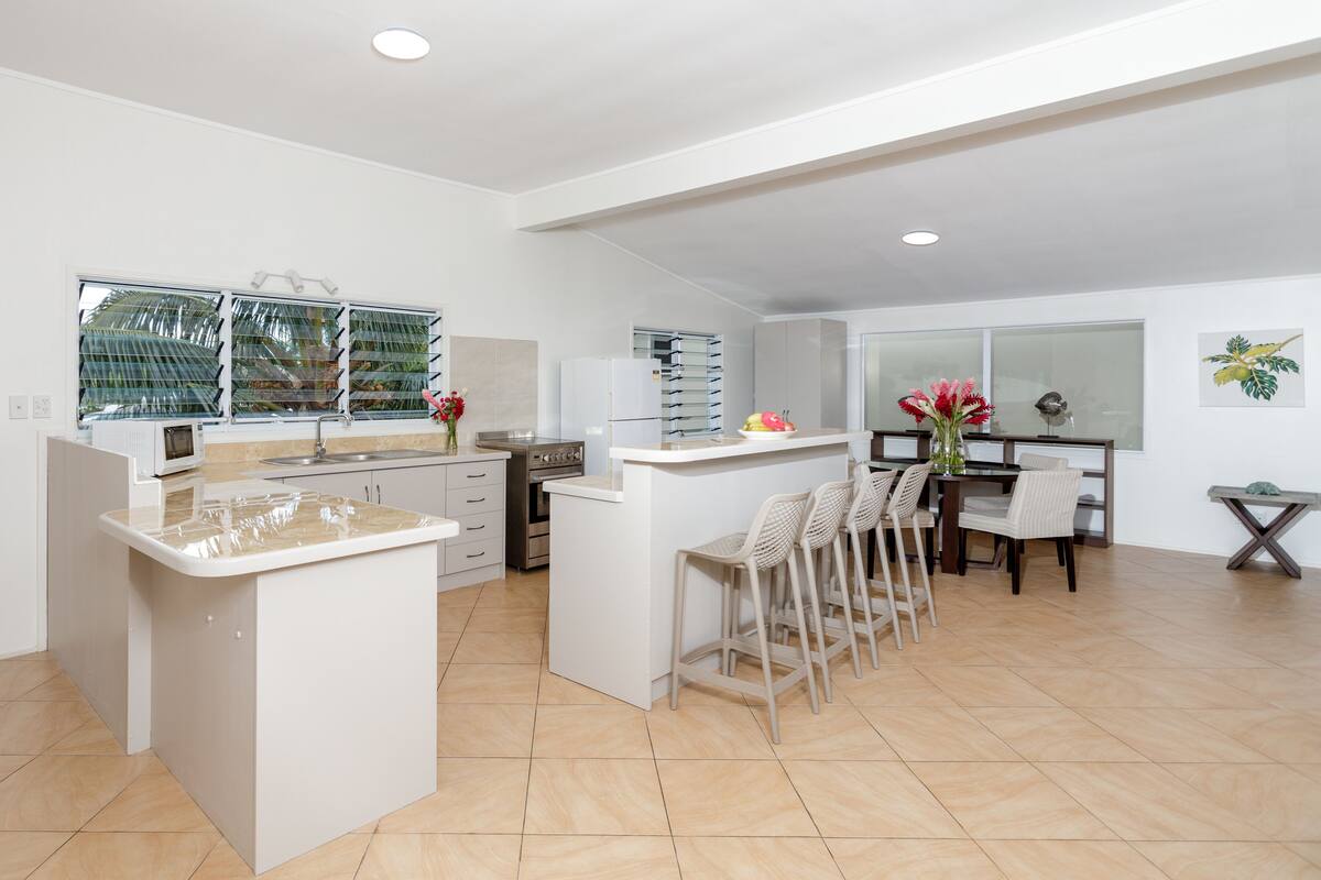 3 bedroom beachfront apartment | private kitchen | full-sized fridge, microwave, stovetop, coffee/tea maker