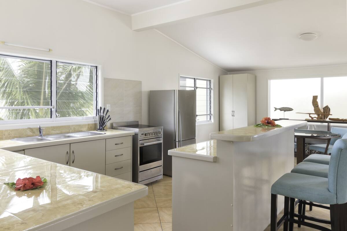 3 bedroom beachfront apartment | private kitchen | full-sized fridge, microwave, stovetop, coffee/tea maker