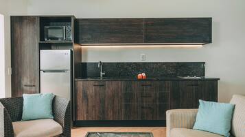 Villa, 2 Bedrooms, Beach View, Beachfront | Private kitchen | Full-size fridge, microwave, stovetop, coffee/tea maker