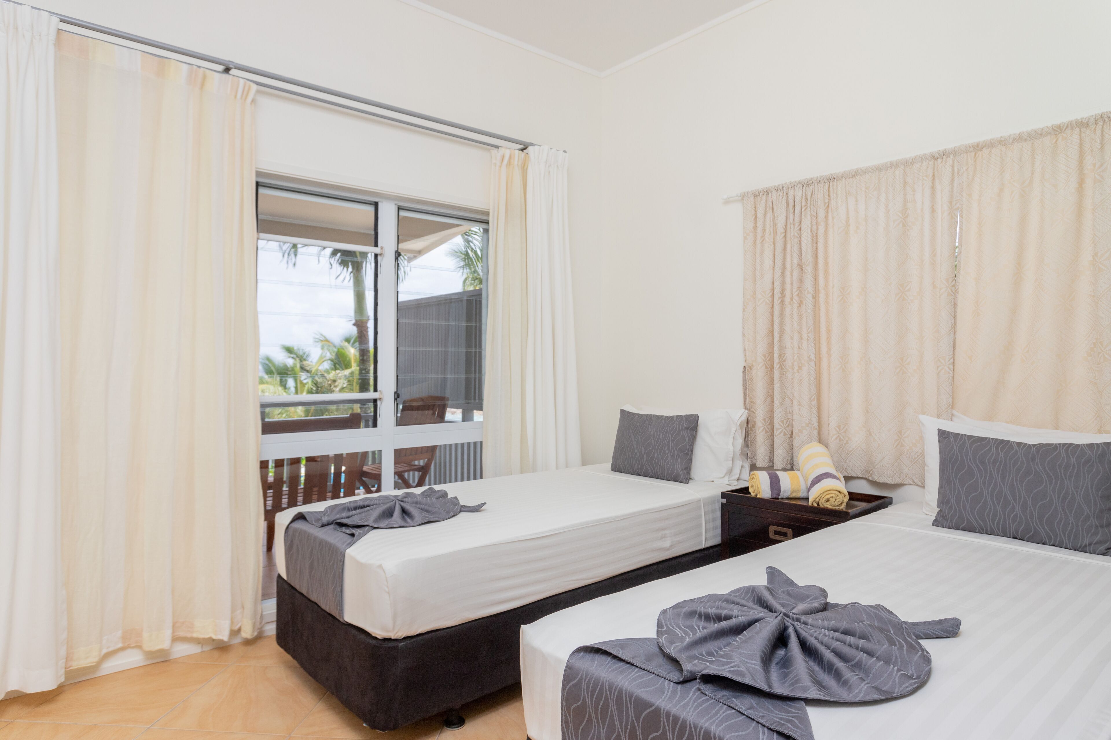 3 bedroom beachfront apartment | 3 bedrooms, premium bedding, in-room safe, iron/ironing board