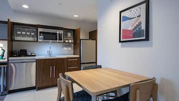 Suite, 1 King Bed with Sofa bed, Non Smoking | Private kitchen | Full-sized fridge, microwave, coffee/tea maker, cookware/dishes/utensils