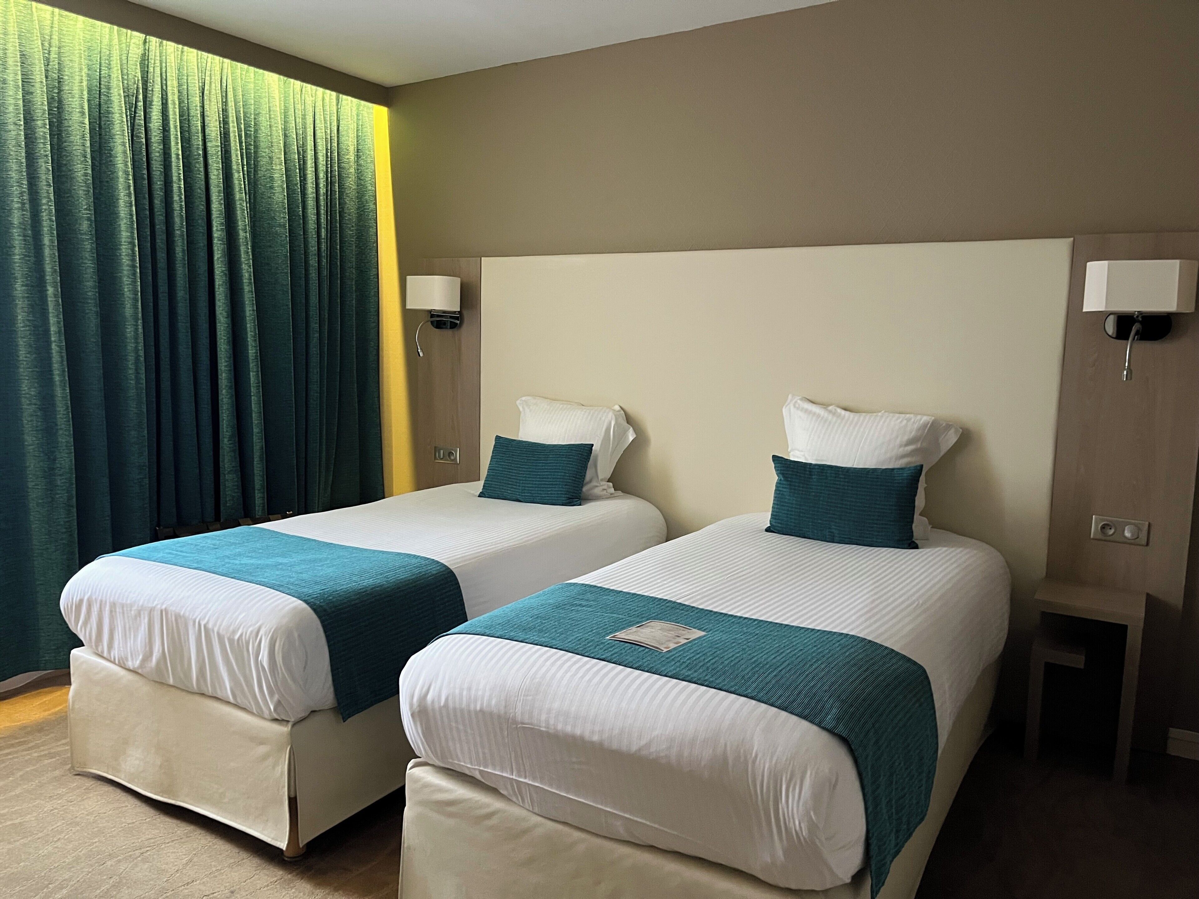 Premium bedding, desk, blackout curtains, free WiFi