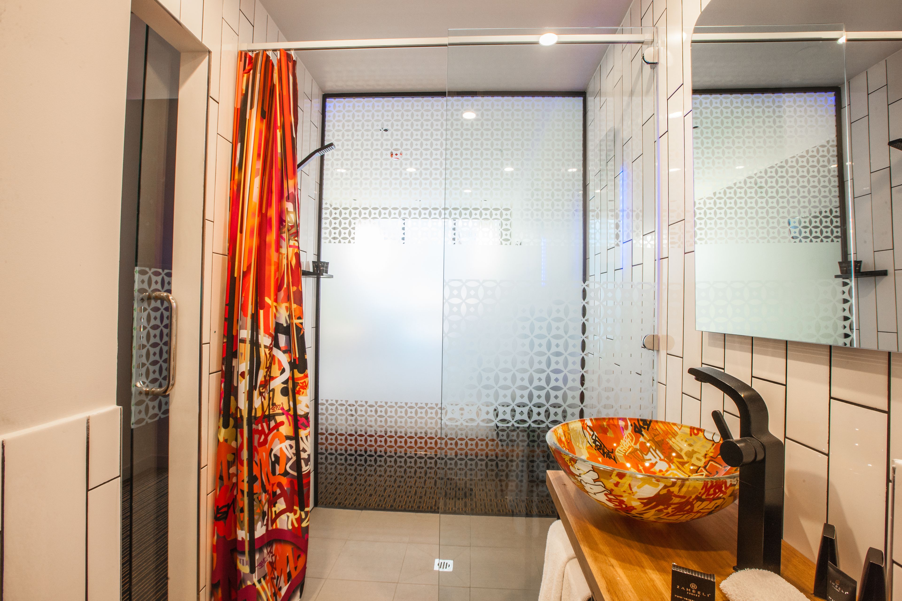 hotel king with wifi | bathroom | designer toiletries, hair dryer, towels