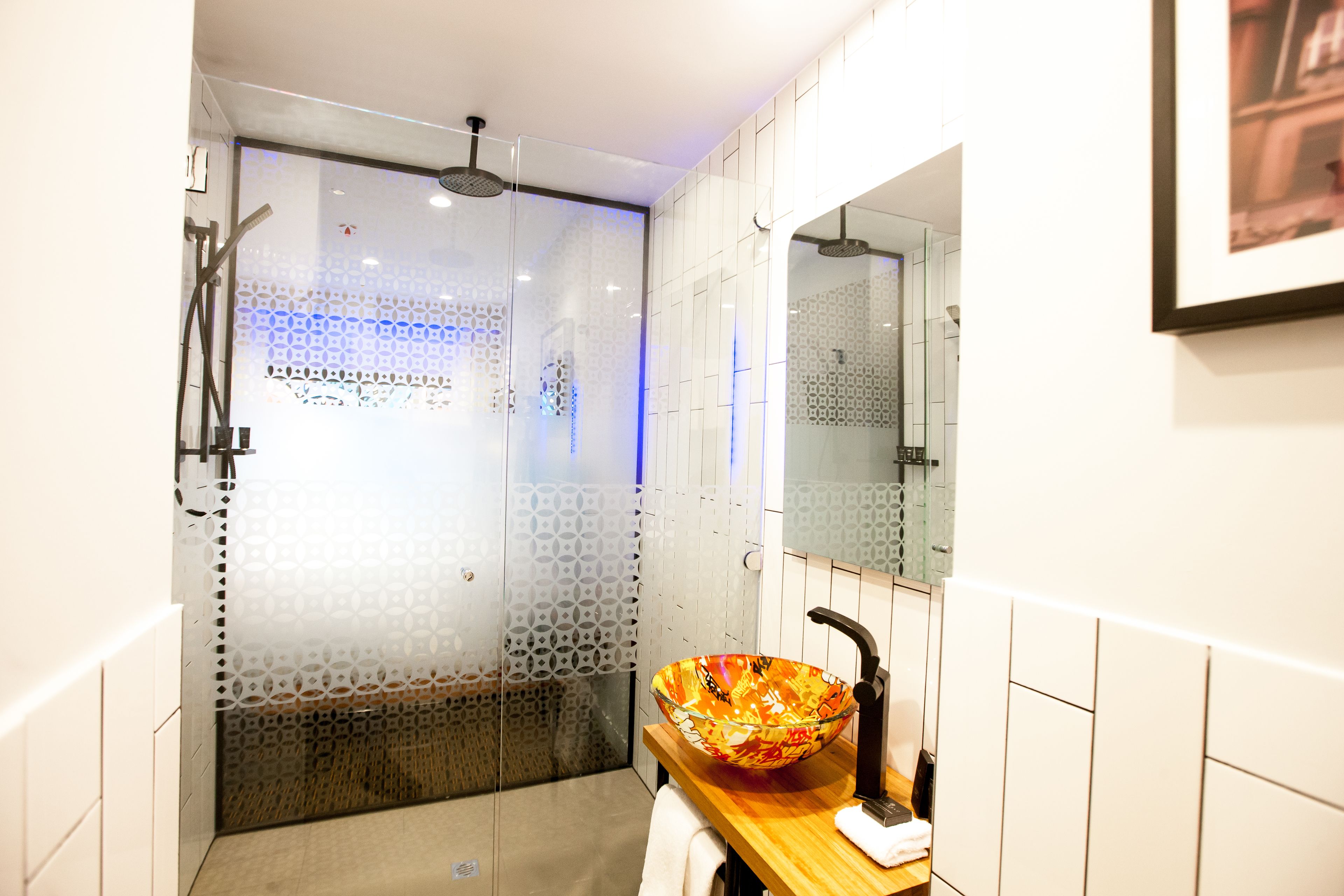 hotel king, courtyard with wifi | bathroom | designer toiletries, hair dryer, towels